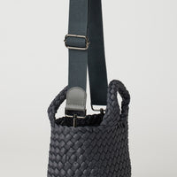 Andreina Bags Lupe crossbody bag in charcoal colour. small size yet roomy. Handmade, interlaced material, synthetic material, water resistant, machine washable, adjustable strap, lightweight. Can be worn as crossbody or as a handbag. Designed in Sydney, Australia.