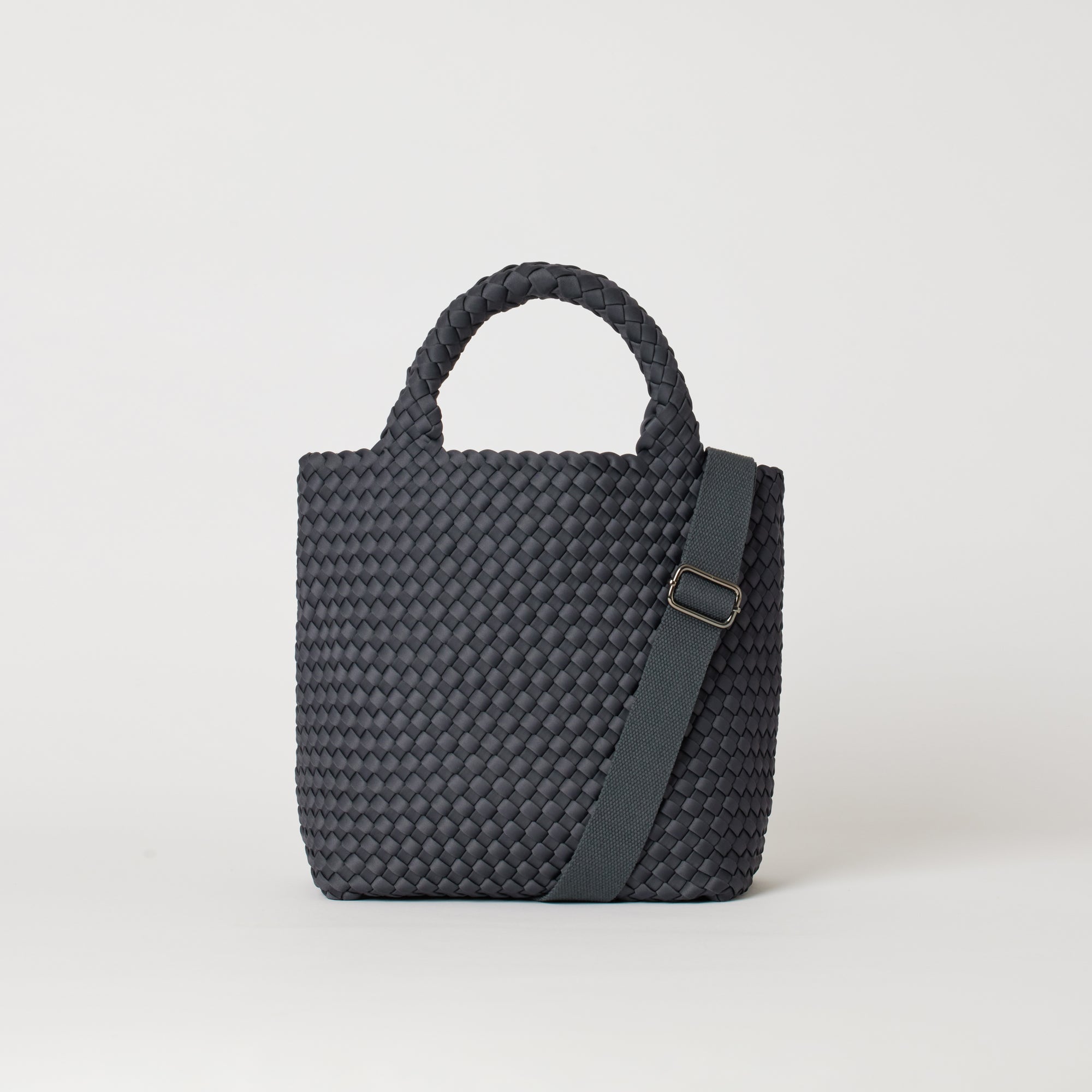 Andreina Bags Ciudad crossbody bag in charcoal colour. Medium size. Handmade, interlaced material, synthetic material water resistant, machine washable, adjustable strap, lightweight. Can be worn as crossbody or as a handbag. Designed in Sydney, Australia.