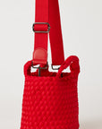 Andreina Bags Lupe crossbody bag in red colour. small size yet roomy. Handmade, interlaced material, synthetic material, water resistant, machine washable, adjustable strap, lightweight. Can be worn as crossbody or as a handbag. Designed in Sydney, Australia.