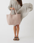 Andreina Bags Siempre tote bag in light pink colour. Colour name is rose. Large size yet lightweight. Handmade, interlaced material, synthetic material, water resistant, machine washable. Designed in Sydney, Australia.