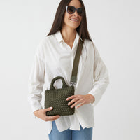 Andreina Bags Lupe crossbody bag in army green colour. small size yet roomy. Handmade, interlaced material, synthetic material, water resistant, machine washable, adjustable strap, lightweight. Can be worn as crossbody or as a handbag. Designed in Sydney, Australia.