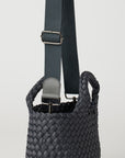 Andreina Bags Ciudad crossbody bag in charcoal colour. Medium size. Handmade, interlaced material, synthetic material water resistant, machine washable, adjustable strap, lightweight. Can be worn as crossbody or as a handbag. Designed in Sydney, Australia.