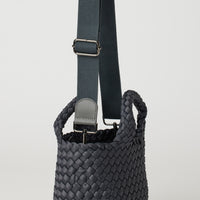 Andreina Bags Ciudad crossbody bag in charcoal colour. Medium size. Handmade, interlaced material, synthetic material water resistant, machine washable, adjustable strap, lightweight. Can be worn as crossbody or as a handbag. Designed in Sydney, Australia.