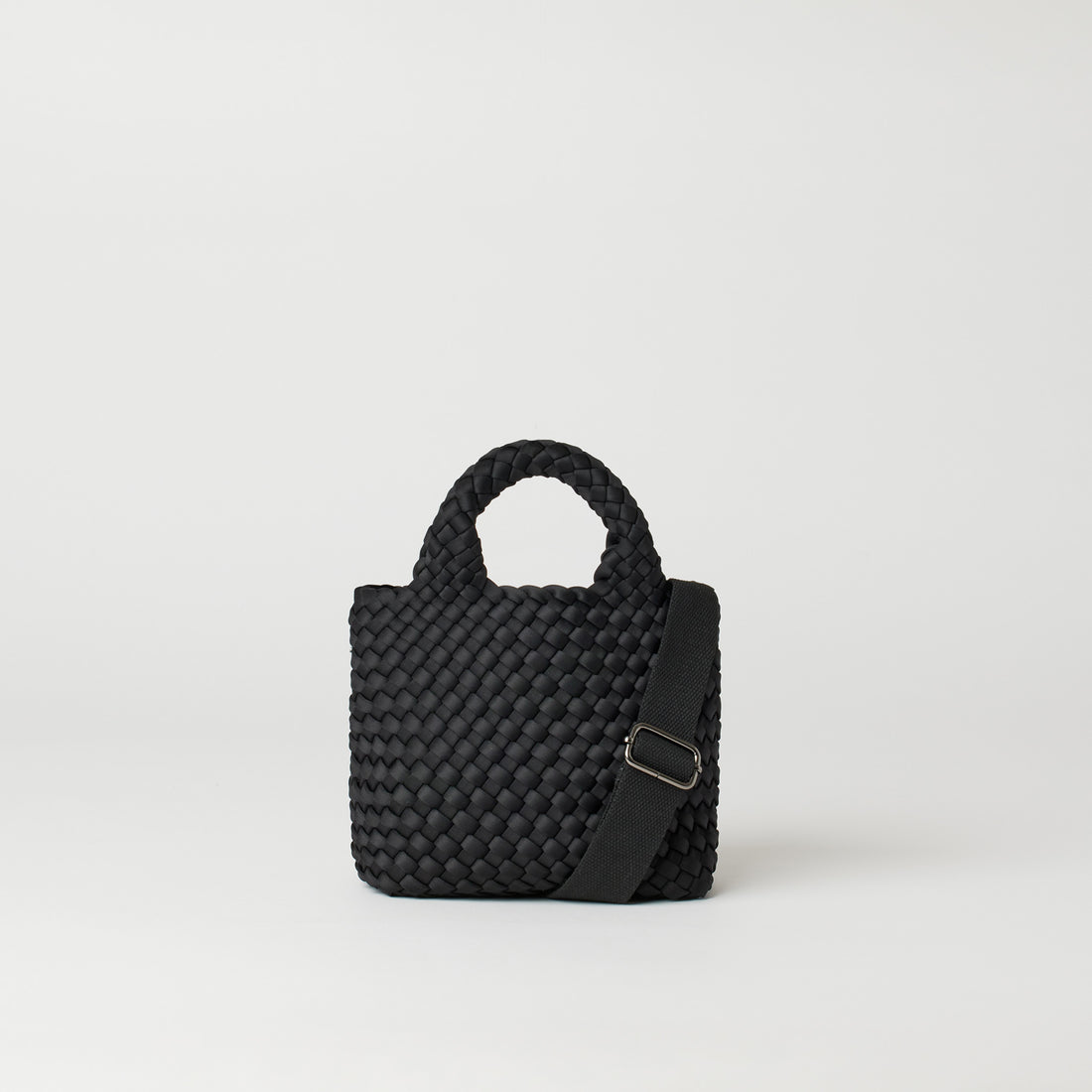 Andreina Bags Lupe crossbody bag in black colour. small size yet roomy. Handmade, interlaced material, synthetic material, water resistant, machine washable, adjustable strap, lightweight. Can be worn as crossbody or as a handbag. Designed in Sydney, Australia.