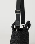 Andreina Bags Lupe crossbody bag in black colour. small size yet roomy. Handmade, interlaced material, synthetic material, water resistant, machine washable, adjustable strap, lightweight. Can be worn as crossbody or as a handbag. Designed in Sydney, Australia.