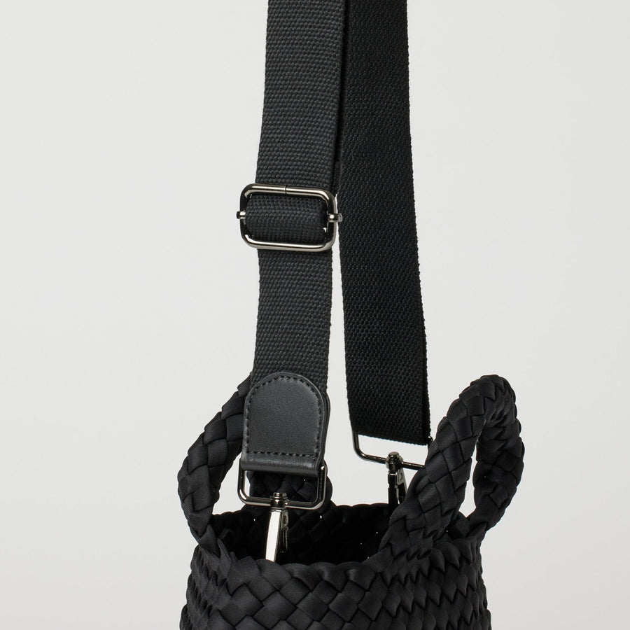 Andreina Bags Ciudad crossbody bag in black colour. Medium size. Handmade, interlaced material, synthetic material water resistant, machine washable, adjustable strap, lightweight. Can be worn as crossbody or as a handbag. Designed in Sydney, Australia.