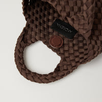 Andreina Bags Lupe crossbody bag in brown colour. small size yet roomy. Handmade, interlaced material, synthetic material, water resistant, machine washable, adjustable strap, lightweight. Can be worn as crossbody or as a handbag. Designed in Sydney, Australia.