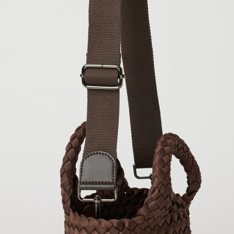 Andreina Bags Ciudad crossbody bag in brown colour. Medium size. Handmade, interlaced material, synthetic material water resistant, machine washable, adjustable strap, lightweight. Can be worn as crossbody or as a handbag. Designed in Sydney, Australia.