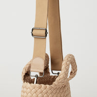 Andreina Bags Ciudad crossbody bag in cream colour. Medium size. Handmade, interlaced material, synthetic material water resistant, machine washable, adjustable strap, lightweight. Can be worn as crossbody or as a handbag. Designed in Sydney, Australia.
