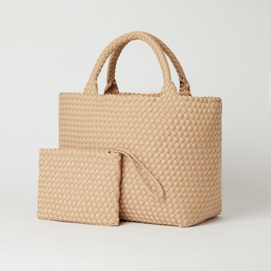 Andreina Bags Siempre tote bag in cream colour. Large size yet lightweight. Comes with matching detached clutch.Handmade, interlaced material, synthetic material, water resistant, machine washable. Designed in Sydney, Australia.