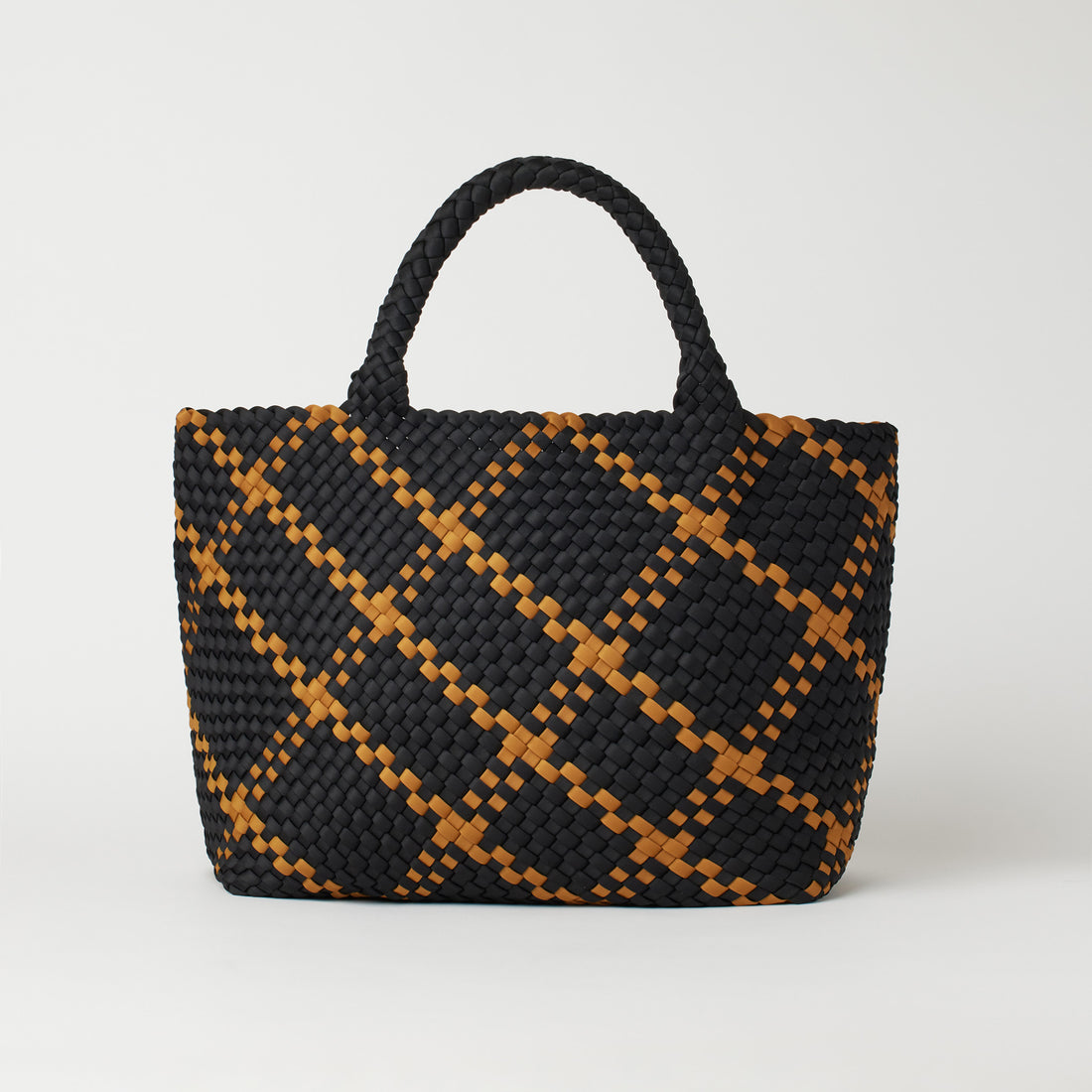 Andreina Bags Siempre tote bag in black colour with mustard criss cross stripes. Colour name is ochre. Large size yet lightweight. Handmade, interlaced material, synthetic material, water resistant, machine washable. Designed in Sydney, Australia.