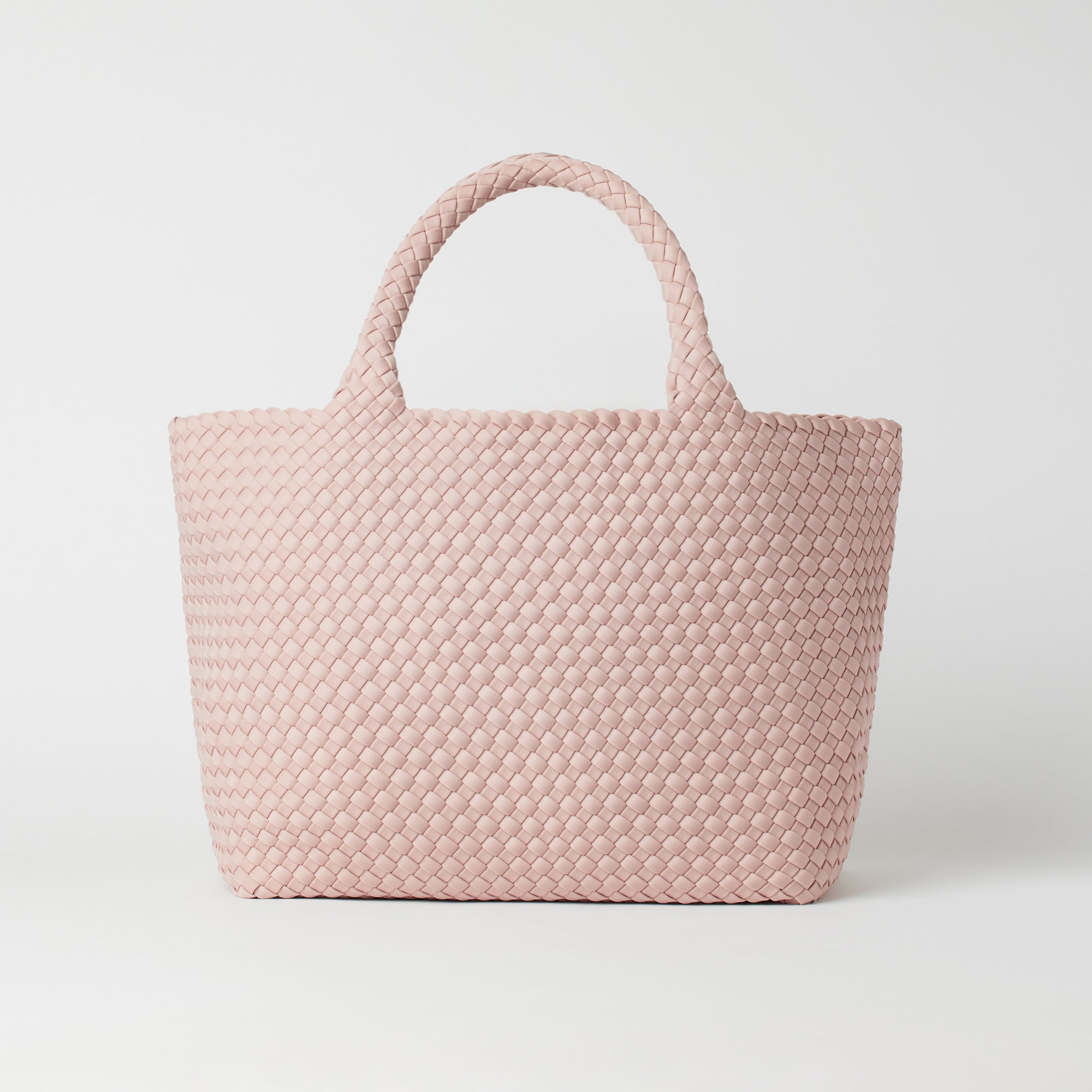 Andreina Bags Siempre tote bag in light pink colour. Colour name is rose. Large size yet lightweight. Handmade, interlaced material, synthetic material, water resistant, machine washable. Designed in Sydney, Australia.