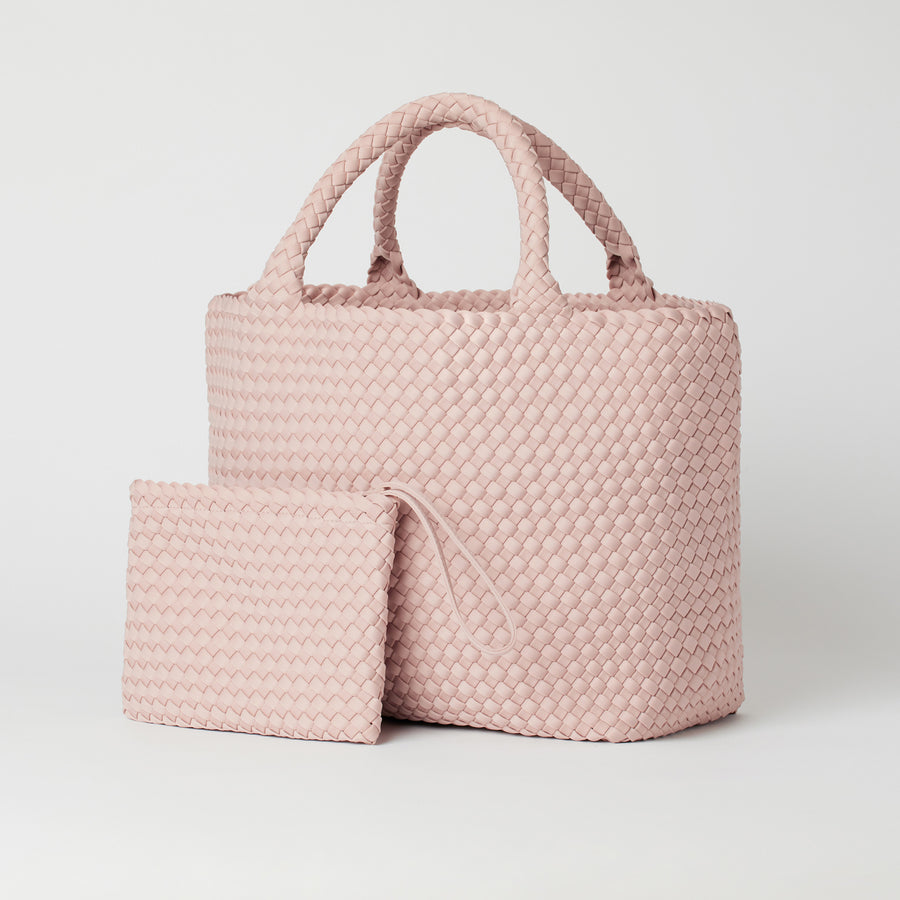 Andreina Bags Siempre tote bag in light pink colour. Colour name is rose. Large size yet lightweight. Comes with matching detached clutch.Handmade, interlaced material, synthetic material, water resistant, machine washable. Designed in Sydney, Australia.